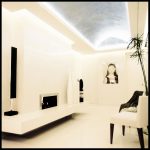 Contemporary white fireplace with vaulted ceiling