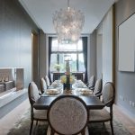 Classic style dining room with leaf shaped chandelier