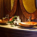 Exotic style bathroom with copper basin sinks