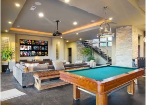 Play room with pool table and projector screen