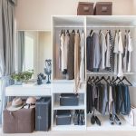 Walk-in wardrobe with dressing table and mirror