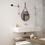 Steaming bath in modern white bathroom with wooden stools and mirror