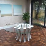 Modern glass round table in dining room