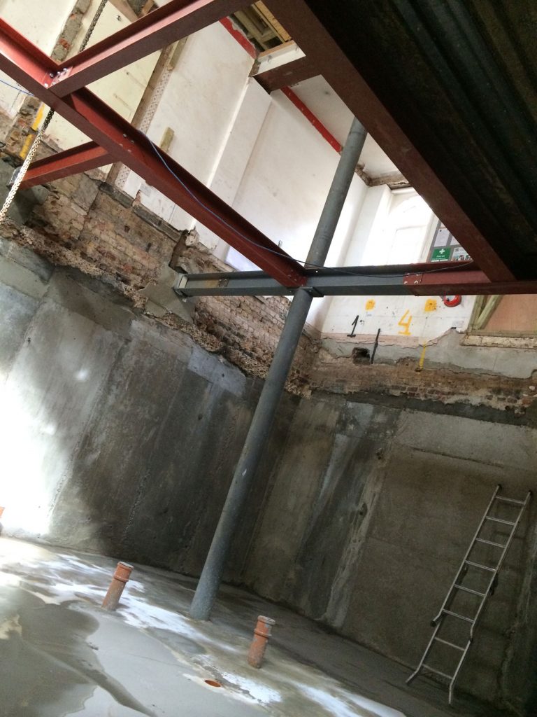 Basement construction showing rolled steel joists