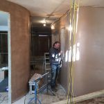 Plastering walls as part of renovation project
