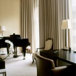 Lounge room including grand piano