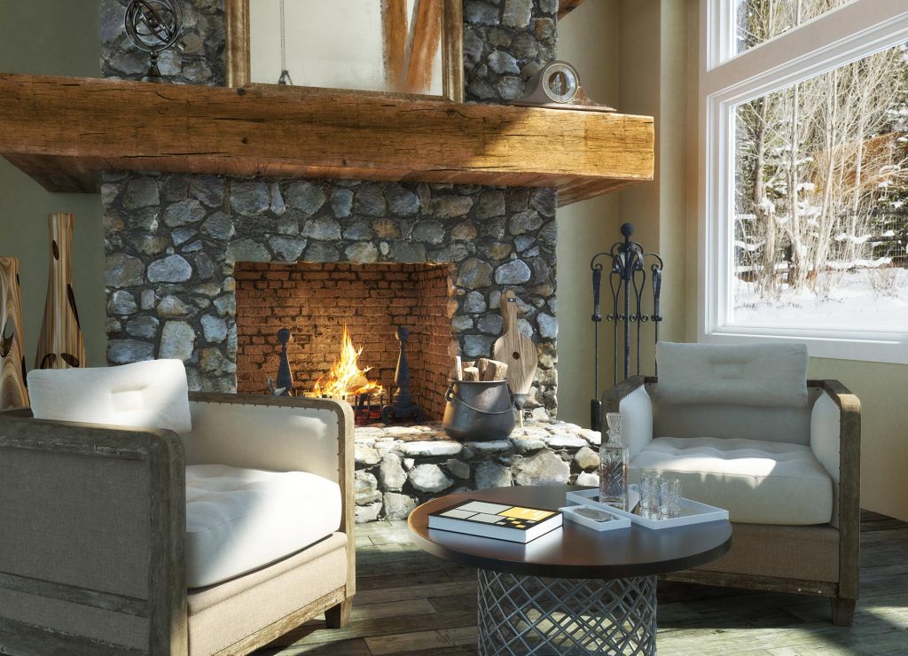 Roaring log fire in stone fireplace